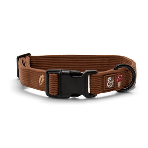 Lucy & Co. brown corduroy dog collar featuring embroidered mushroom and fern details with black hardware.