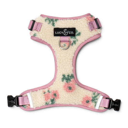 Lucy & Co. In Full Bloom teddy fleece dog harness with floral print, pink trim, and front leash attachment point.