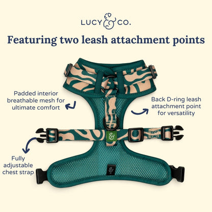 Lucy & Co. x Parks Project Geyser no-pull dog harness in green and tan with adjustable straps and dual leash clips.