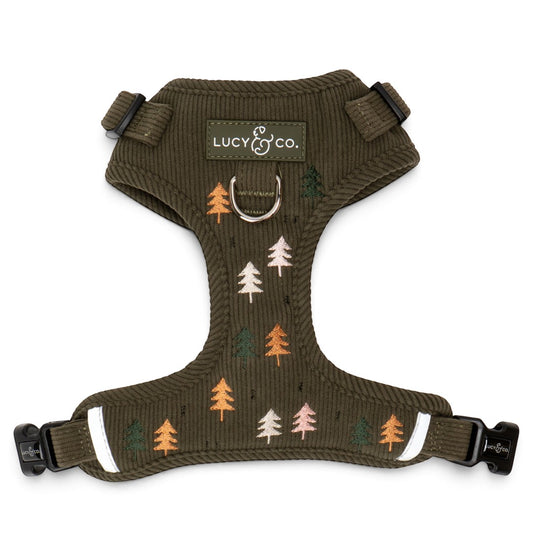 Lucy & Co. olive green corduroy dog harness with embroidered pine tree pattern and front leash attachment point.