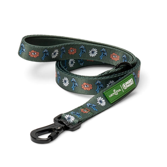 Lucy & Co. Power to the Parks dog leash in olive green with mushroom and flower print and a black locking carabiner
