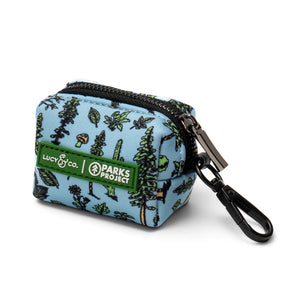 Lucy & Co. x Parks Project light blue neoprene poop bag holder with nature-themed print and black hardware