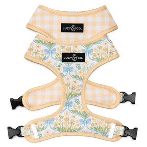 Lucy & Co. reversible dog harness with floral print on one side and yellow gingham on the other, made of neoprene.